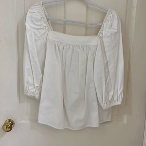 Boutique brand Anna Mashburn , classic white Balloon sleeved blouse.
